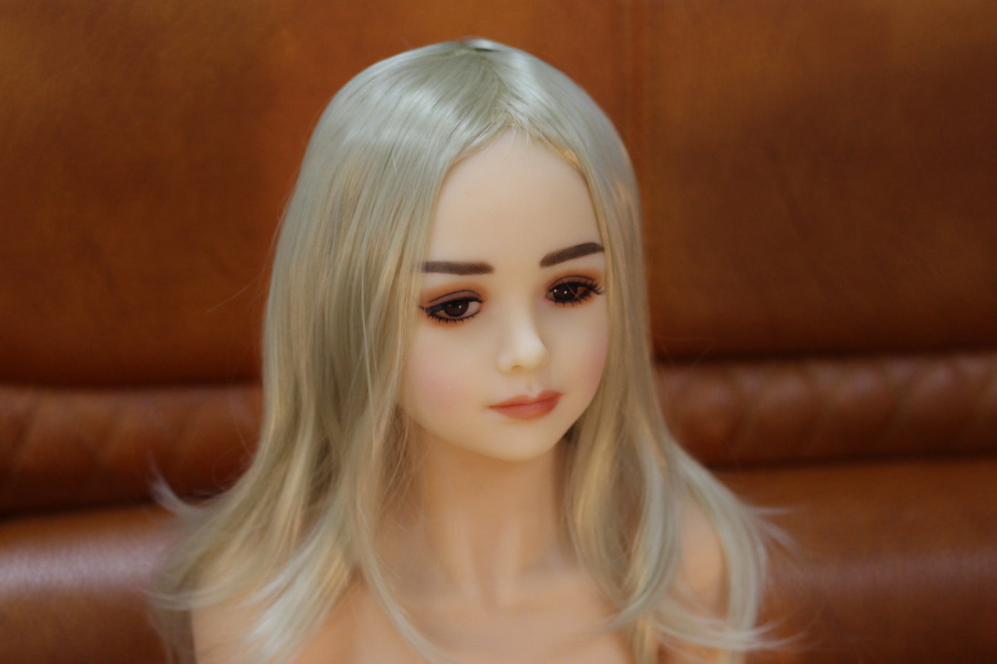 Lucia blonde sex doll in cosplay outfit