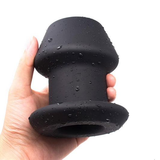 Extra-large hollow anal plug for kinky play