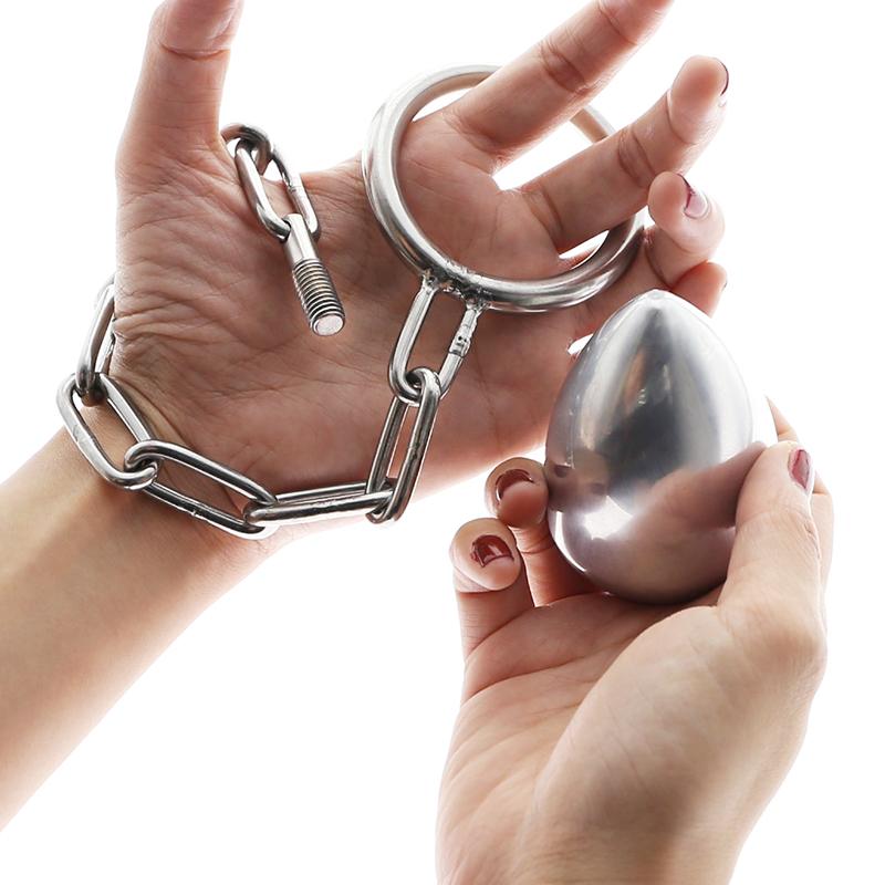 Steel anal plug with chained cock ring