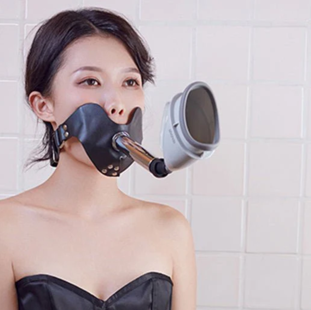 How does this gag reinforce obedience and control?