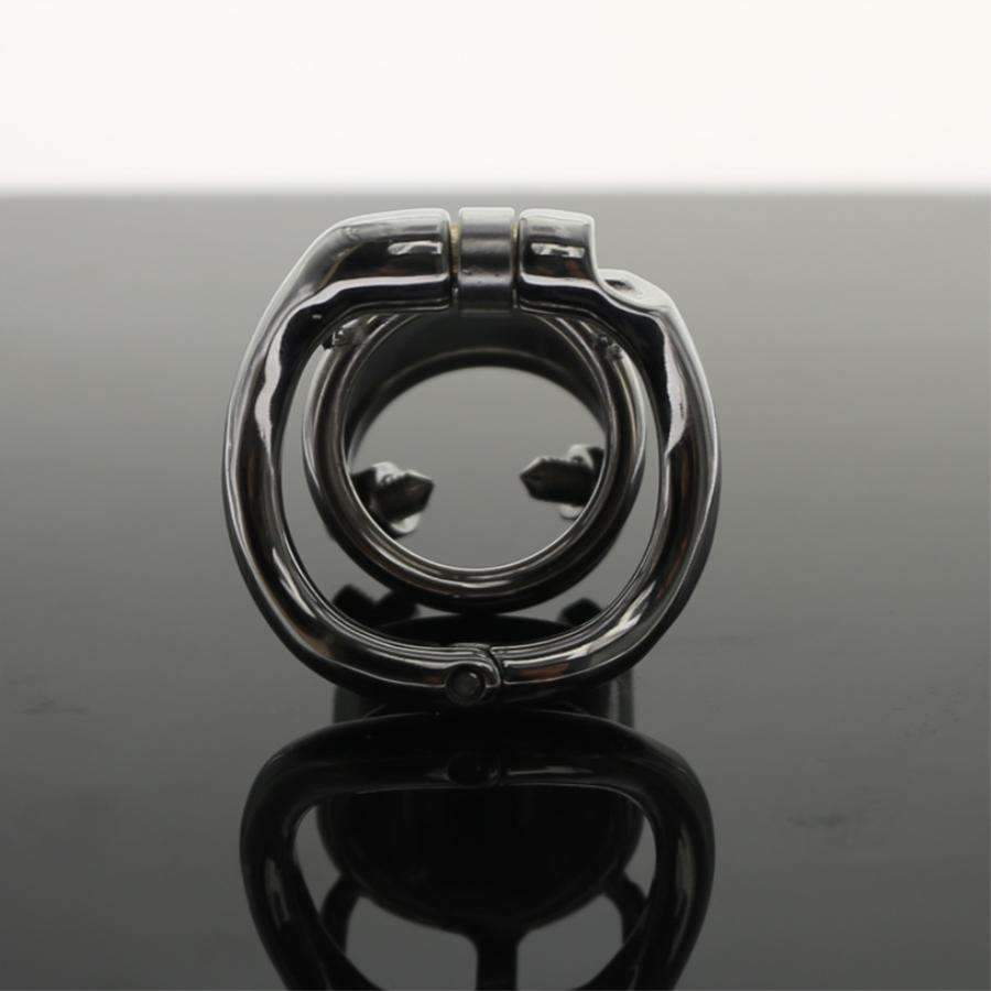 Spiked cock cage for painful discipline