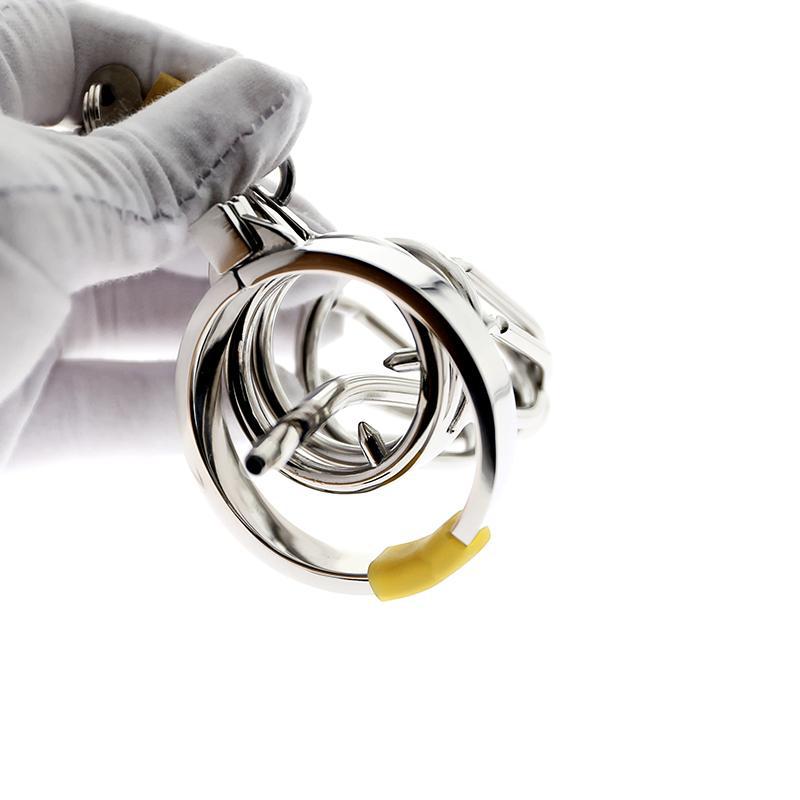 Short cock cage with urethral spout for longer denial